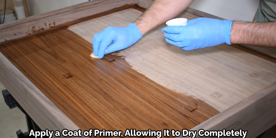 Apply a Coat of Primer, Allowing It to Dry Completely