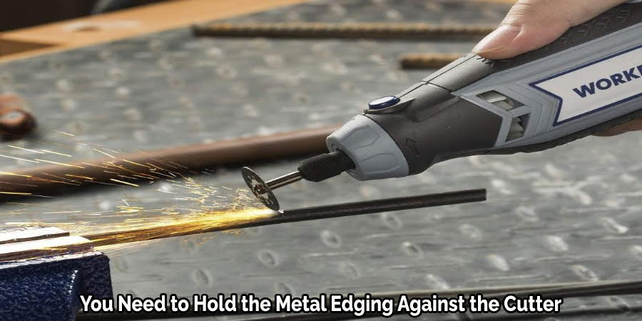 You Need to Hold the Metal Edging Against the Cutter