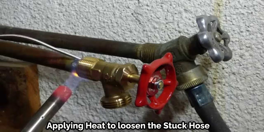 Applying Heat to loosen the Stuck Hose