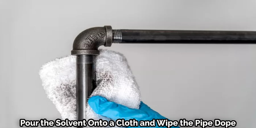 Removing Pipe Dope With Solvent