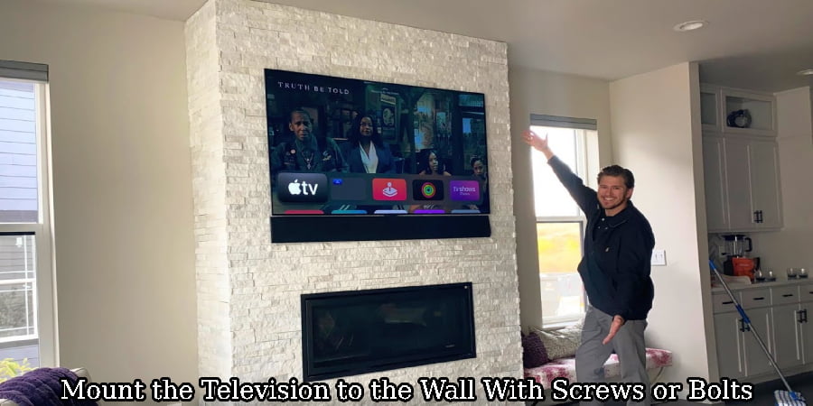 Mount the Television to the Wall With Screws or Bolts