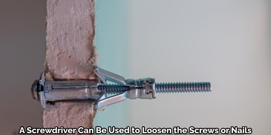 A Screwdriver Can Be Used to Loosen the Screws or Nails