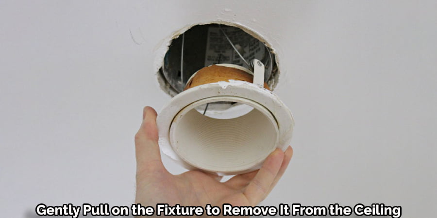 Gently Pull on the Fixture to Remove It From the Ceiling